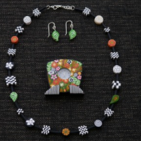 clock pin, necklace and earrings